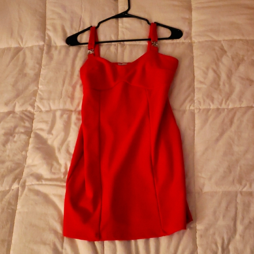 This is an extra small dark pink dress with chain on the straps.